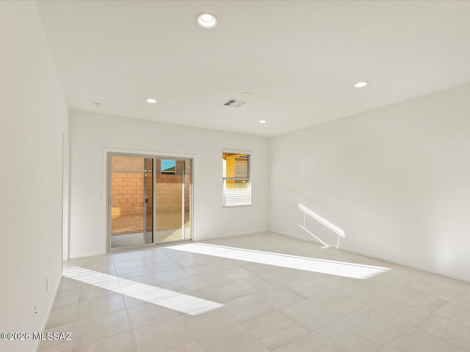 5169 West Gainer Ridge Road Tucson, AZ 85757 - Photo 8 of 17 Photos shown are of a similar floor plan and are intended to provide a close representation of the actual home. Images may include features, finishes, countertops, fixtures, flooring, cabinets, color of cabinets, furnishings, or decorator elements that are not part of the standard offering. While this specific home may include some of these features, please note it may not include all.