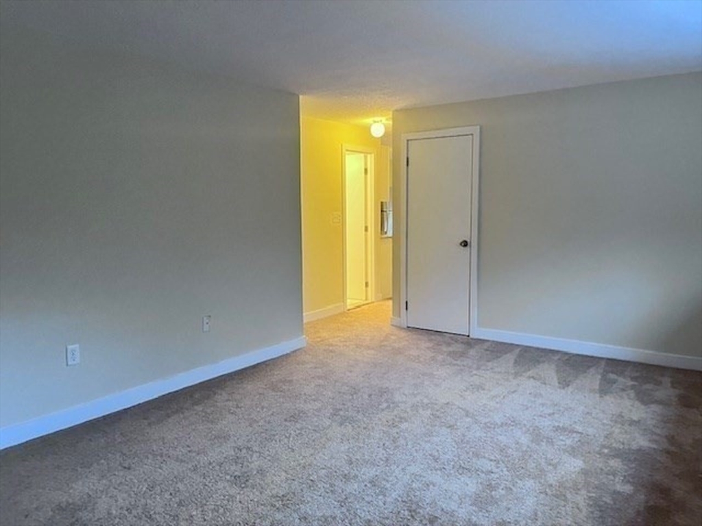 69 Nicholas Road, Unit B Framingham, MA 01701 - Photo 7 of 14 a view of empty room
