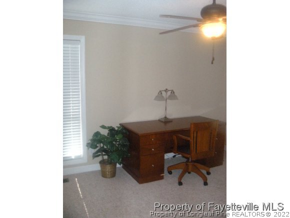 2965 Middlesex Road Fayetteville, NC 28306 - Photo 15 of 25 a room with a desk and chair