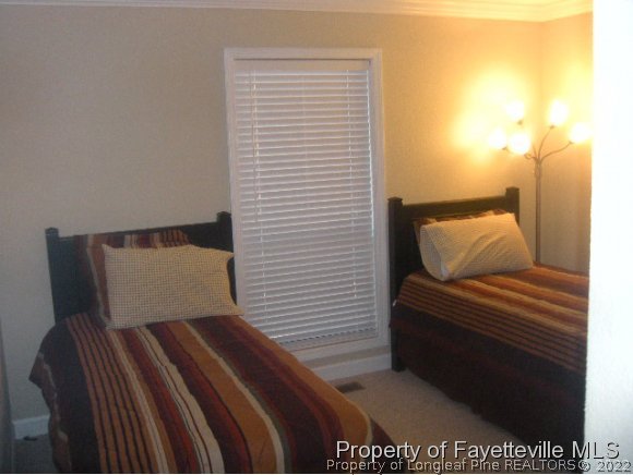 2965 Middlesex Road Fayetteville, NC 28306 - Photo 16 of 25 a view of chair and table in a room