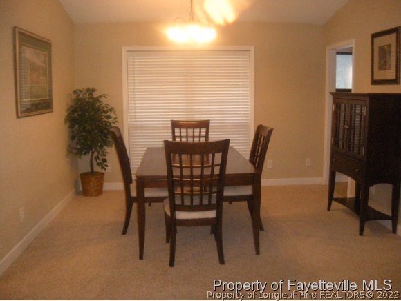 2965 Middlesex Road Fayetteville, NC 28306 - Photo 5 of 25 a view of a dining room with furniture