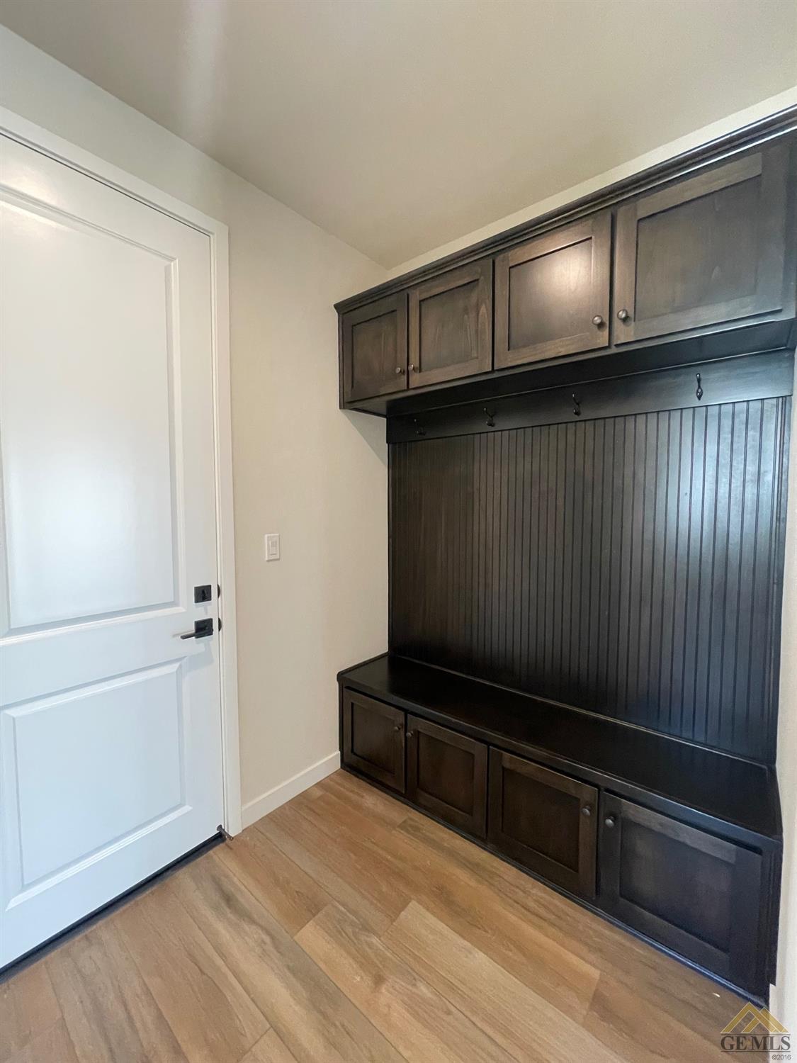 Undisclosed Address Bakersfield, CA 93314 - Photo 14 of 19 Enter from the garage and enjoy your drop zone cabinet!