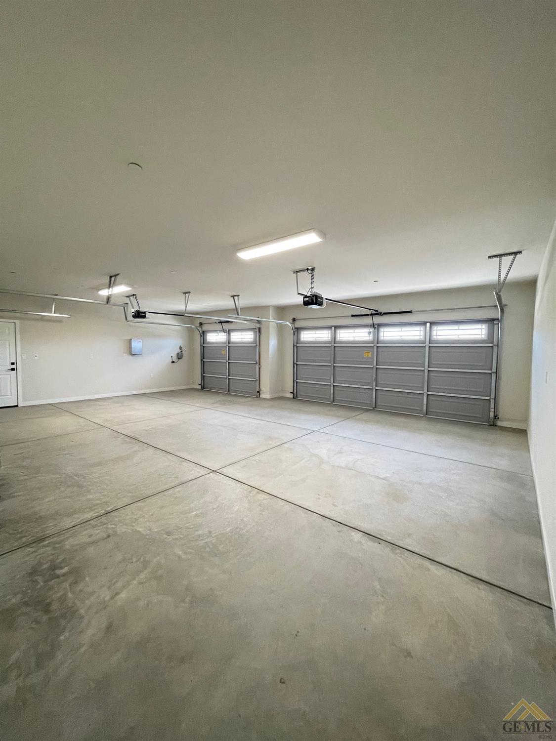 Undisclosed Address Bakersfield, CA 93314 - Photo 17 of 19 Large 3 car garage, finished, painted and baseboards too!