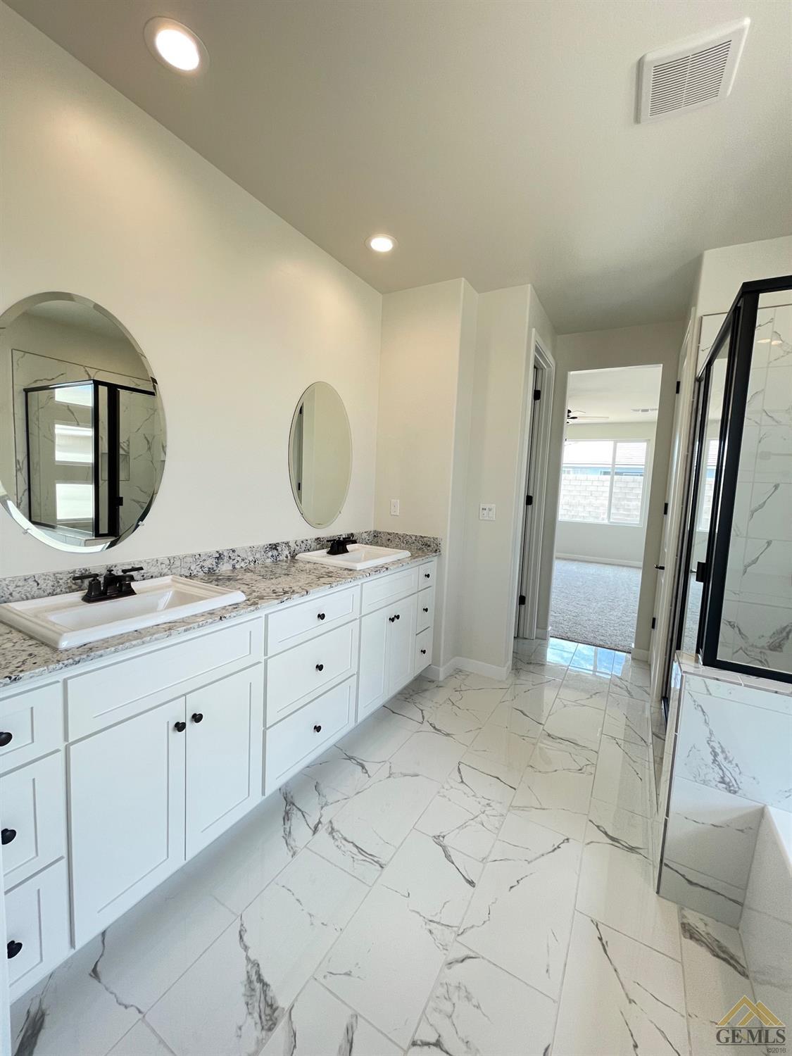 Undisclosed Address Bakersfield, CA 93314 - Photo 8 of 19 Dual vanities in master ensuite.