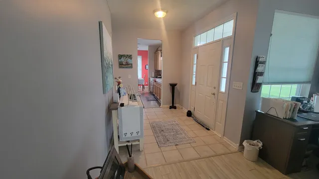 a view of a hallway with workspace