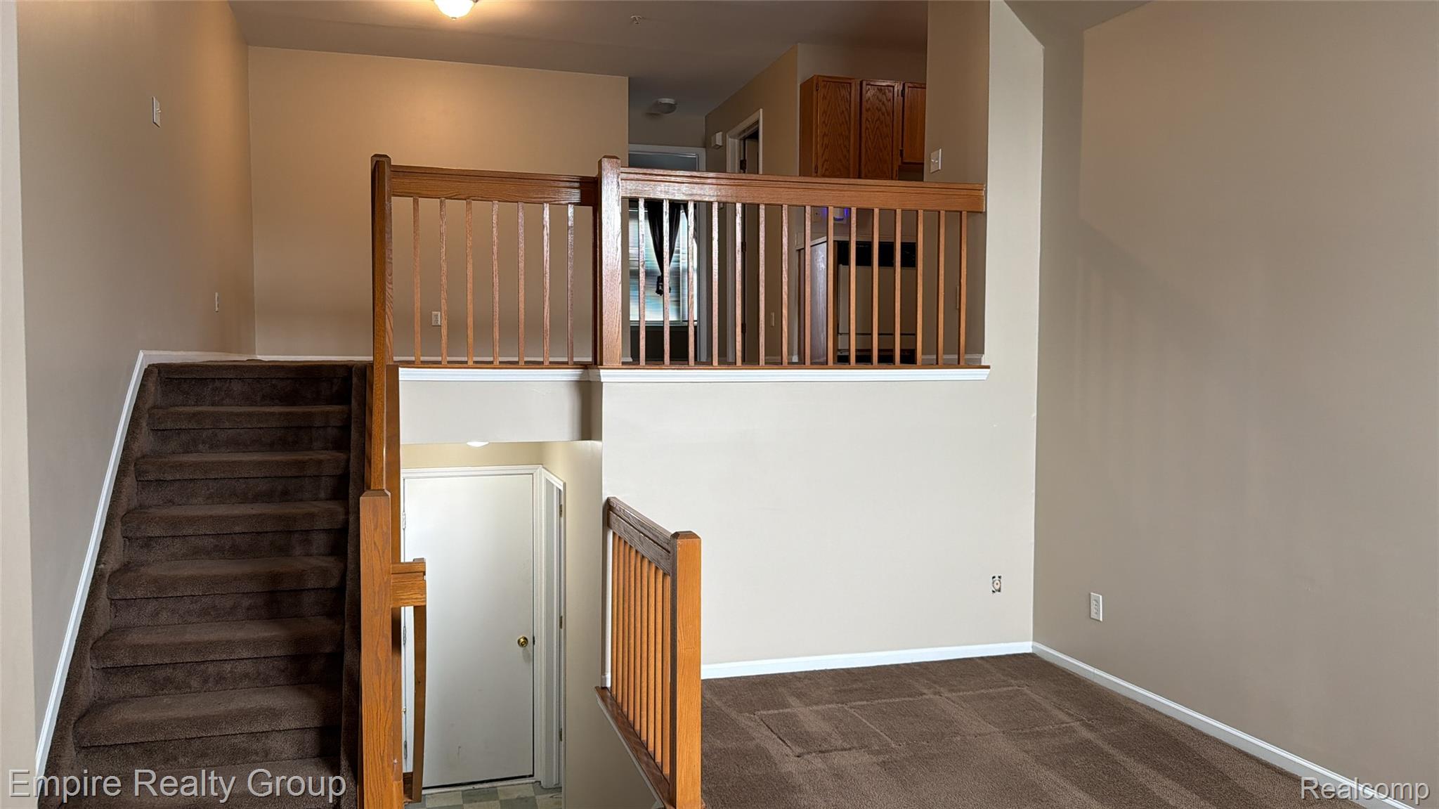 4334 Schaefer Road Dearborn, MI 48126 - Photo 7 of 9 Stairway featuring baseboards and carpet flooring