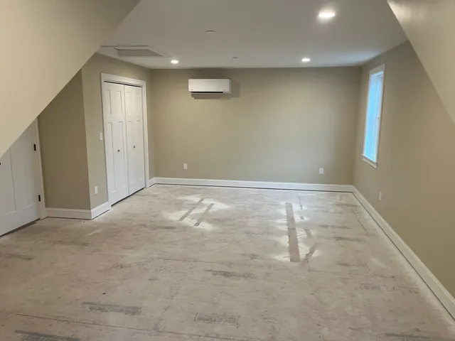 an empty room with a natural light