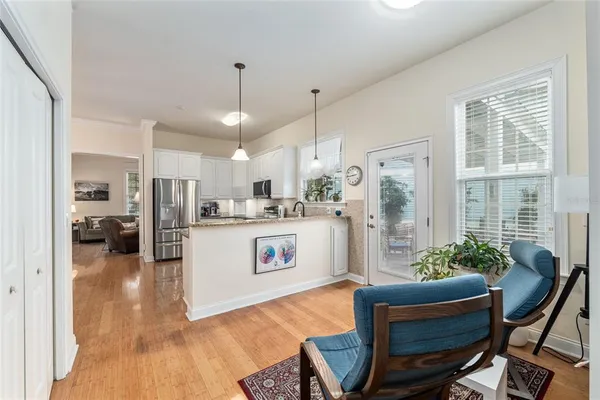 a view of a kitchen and dining room