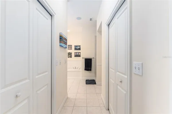 a bathroom with a shower and a mirror