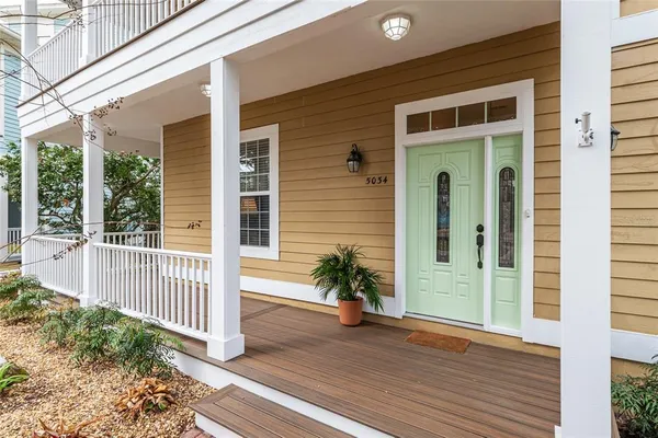 a front view of a house with a porch