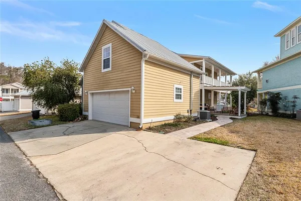 a front view of a house with a patio