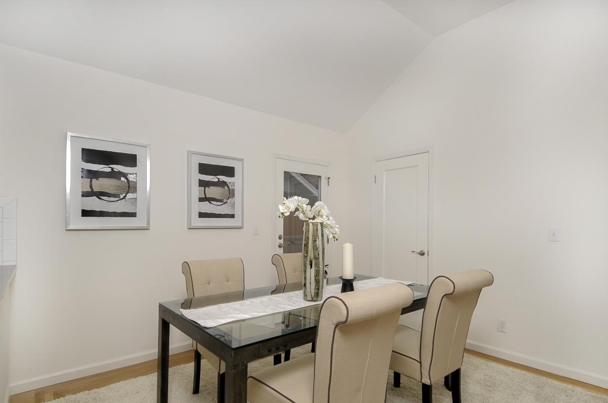 635 California Street Mountain View, CA 94041 - Photo 11 of 25 a view of a dining room with furniture and wooden floor