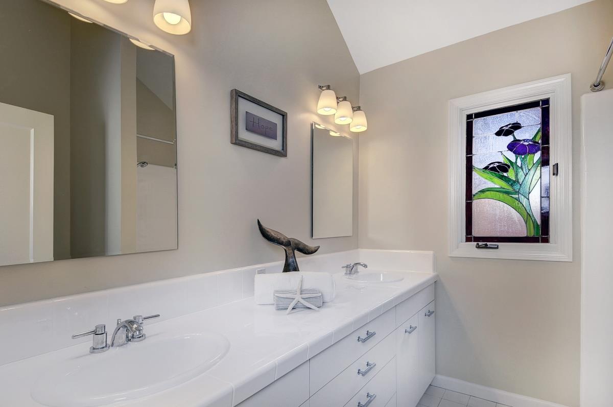 635 California Street Mountain View, CA 94041 - Photo 13 of 25 a bathroom with a sink and a mirror