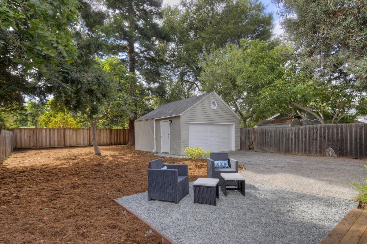 635 California Street Mountain View, CA 94041 - Photo 14 of 25 a backyard of a house with table and chairs