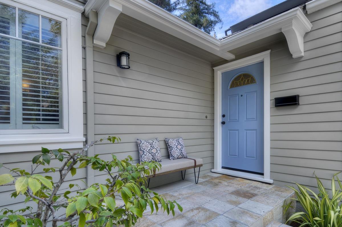 635 California Street Mountain View, CA 94041 - Photo 3 of 25 a front view of a house with a yard