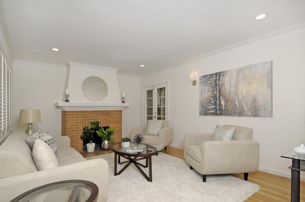 635 California Street Mountain View, CA 94041 - Photo 4 of 25 a living room with furniture and a fireplace