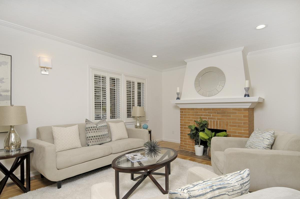 635 California Street Mountain View, CA 94041 - Photo 5 of 25 a living room with furniture and a fireplace