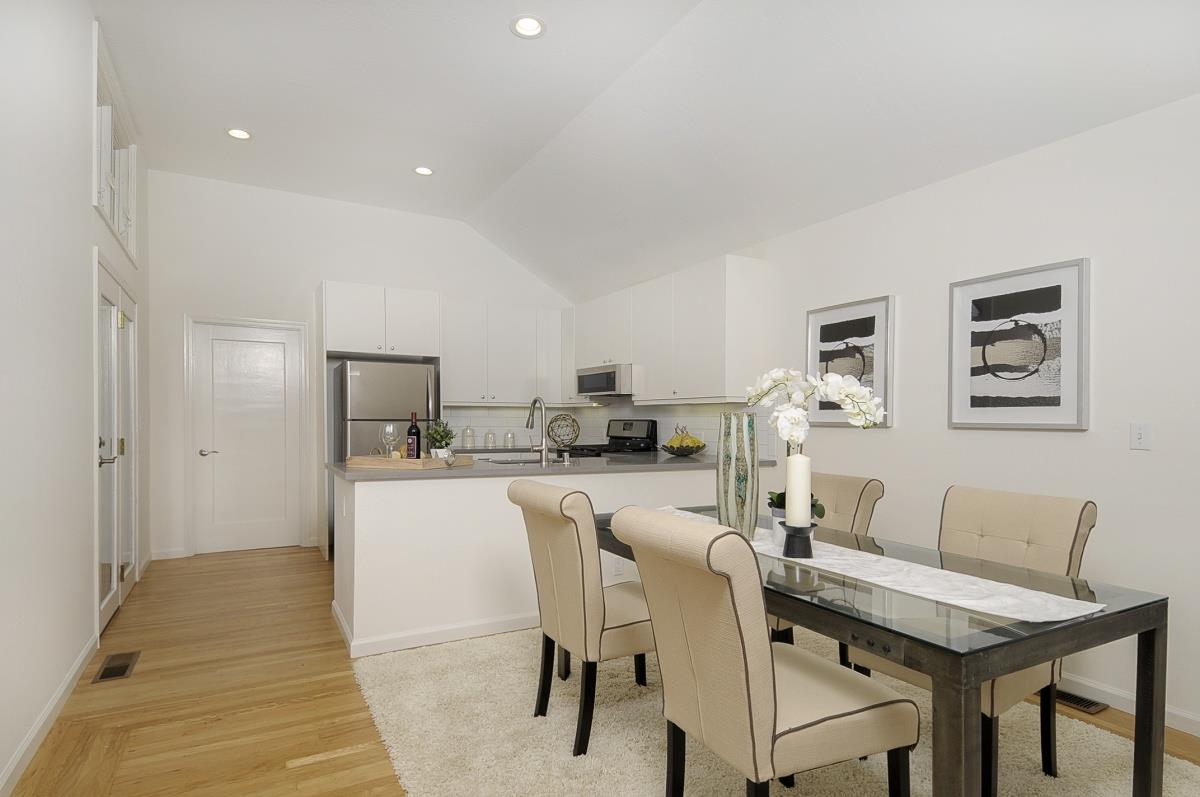 635 California Street Mountain View, CA 94041 - Photo 7 of 25 a view of a dining room with furniture and wooden floor