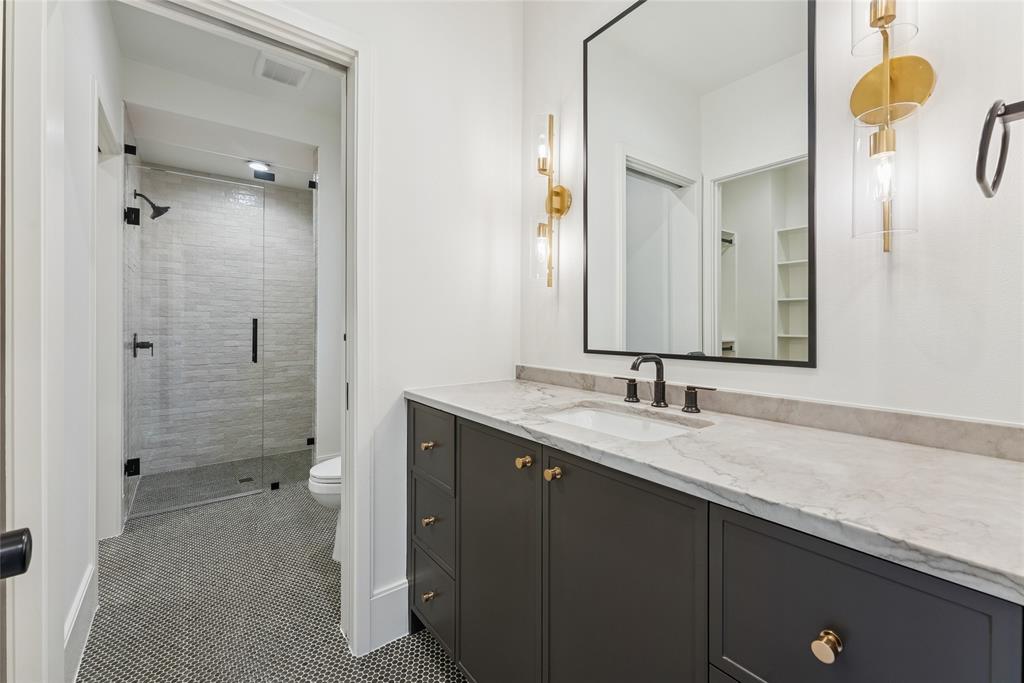 4901 Hanover Avenue Dallas, TX 75209 - Photo 23 of 30 a bathroom with a granite countertop sink mirror and double