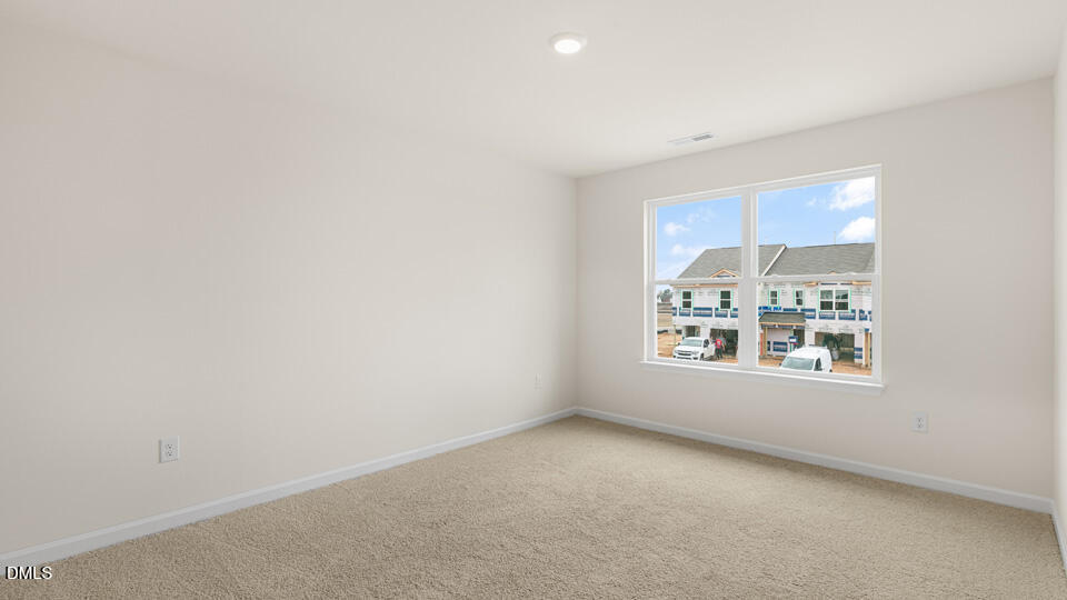 17 Bee Garden Angier, NC 27501 - Photo 14 of 33 an empty room with a window