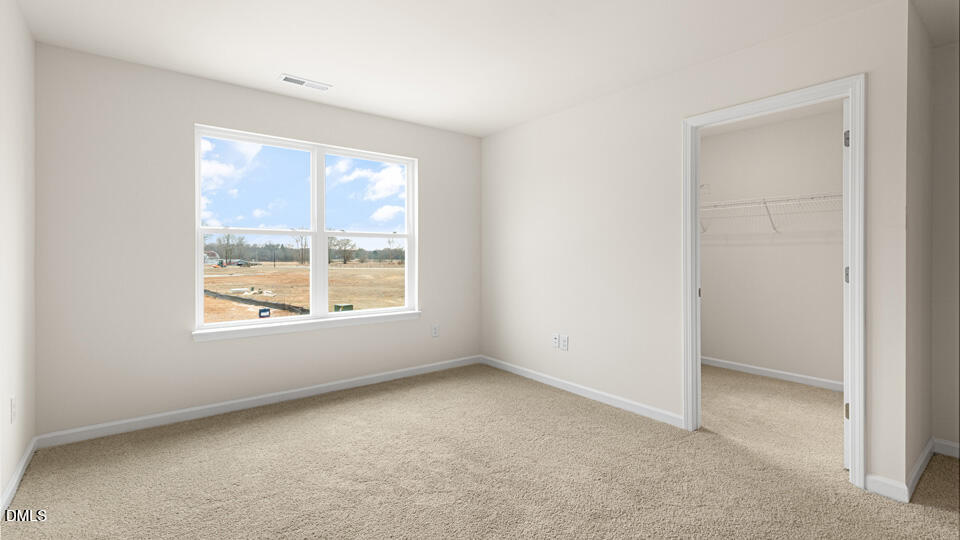 17 Bee Garden Angier, NC 27501 - Photo 15 of 33 an empty room with a window