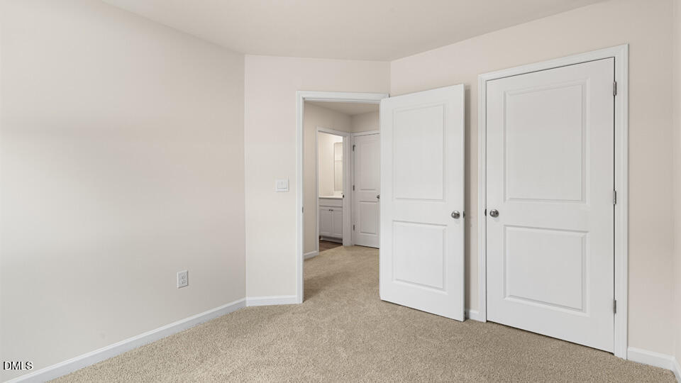 17 Bee Garden Angier, NC 27501 - Photo 16 of 33 a view of an empty room and closet area