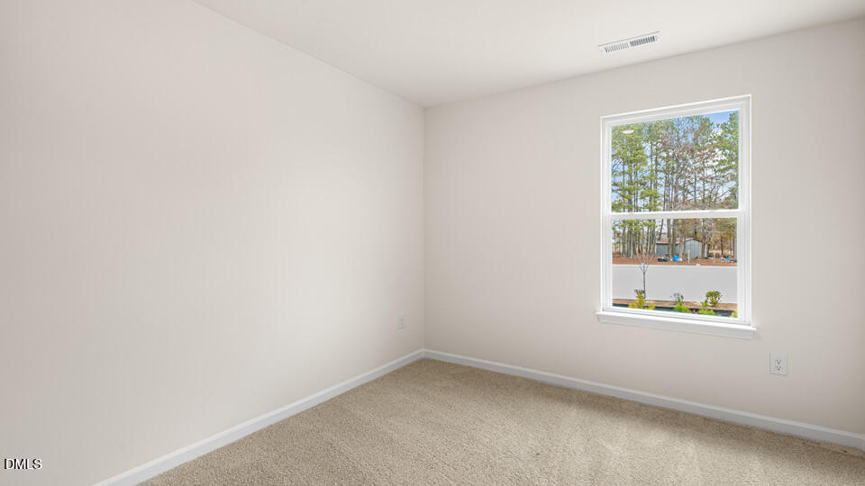 17 Bee Garden Angier, NC 27501 - Photo 17 of 33 an empty room with a window