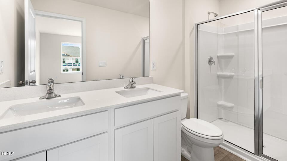 17 Bee Garden Angier, NC 27501 - Photo 20 of 33 a bathroom with a sink toilet and shower