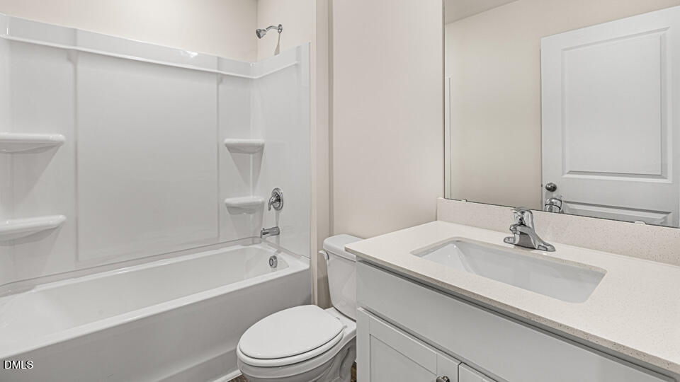 17 Bee Garden Angier, NC 27501 - Photo 21 of 33 a bathroom with a sink toilet and shower