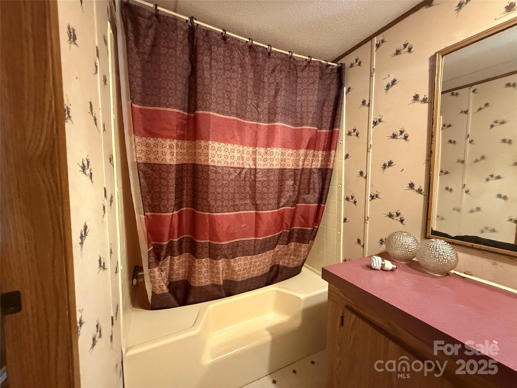 247 Star Road York, SC 29745 - Photo 7 of 9 a bathroom with a bathtub and shower
