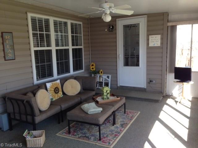 7602 Keating Drive Oak Ridge, NC 27310 - Photo 9 of 18 Screened porch