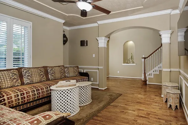a living room with furniture and a rug