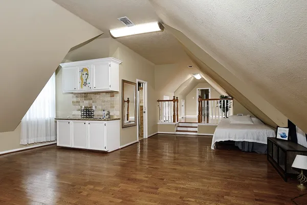 a view of kitchen with furniture and wooden floor