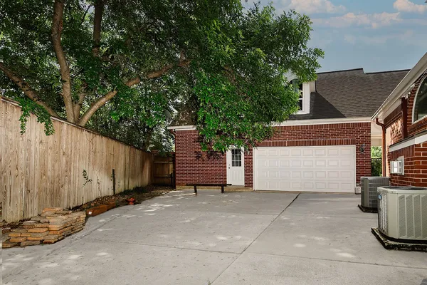 a view of a house with a garage