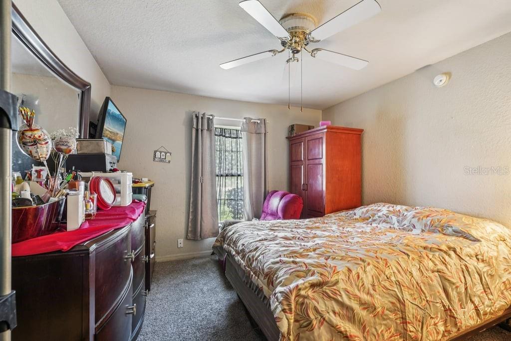 133 Walnut Road Ocala, FL 34480 - Photo 15 of 31 a bedroom with bed and window