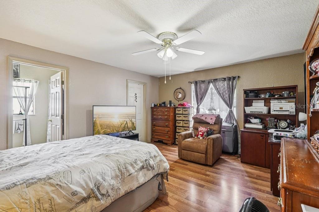 133 Walnut Road Ocala, FL 34480 - Photo 22 of 31 a bedroom with a bed and furniture