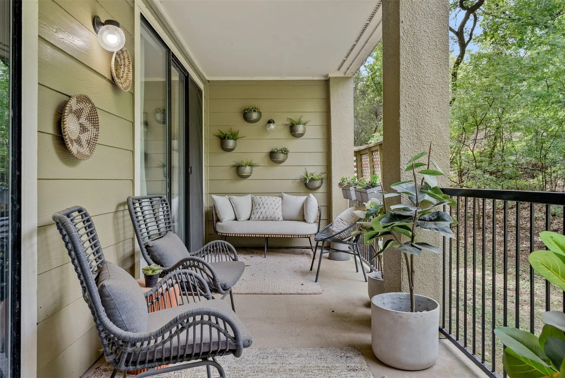 3401 West Parmer Lane, Unit 725 Austin, TX 78727 - Photo 14 of 16 a outdoor living space with furniture and garden view