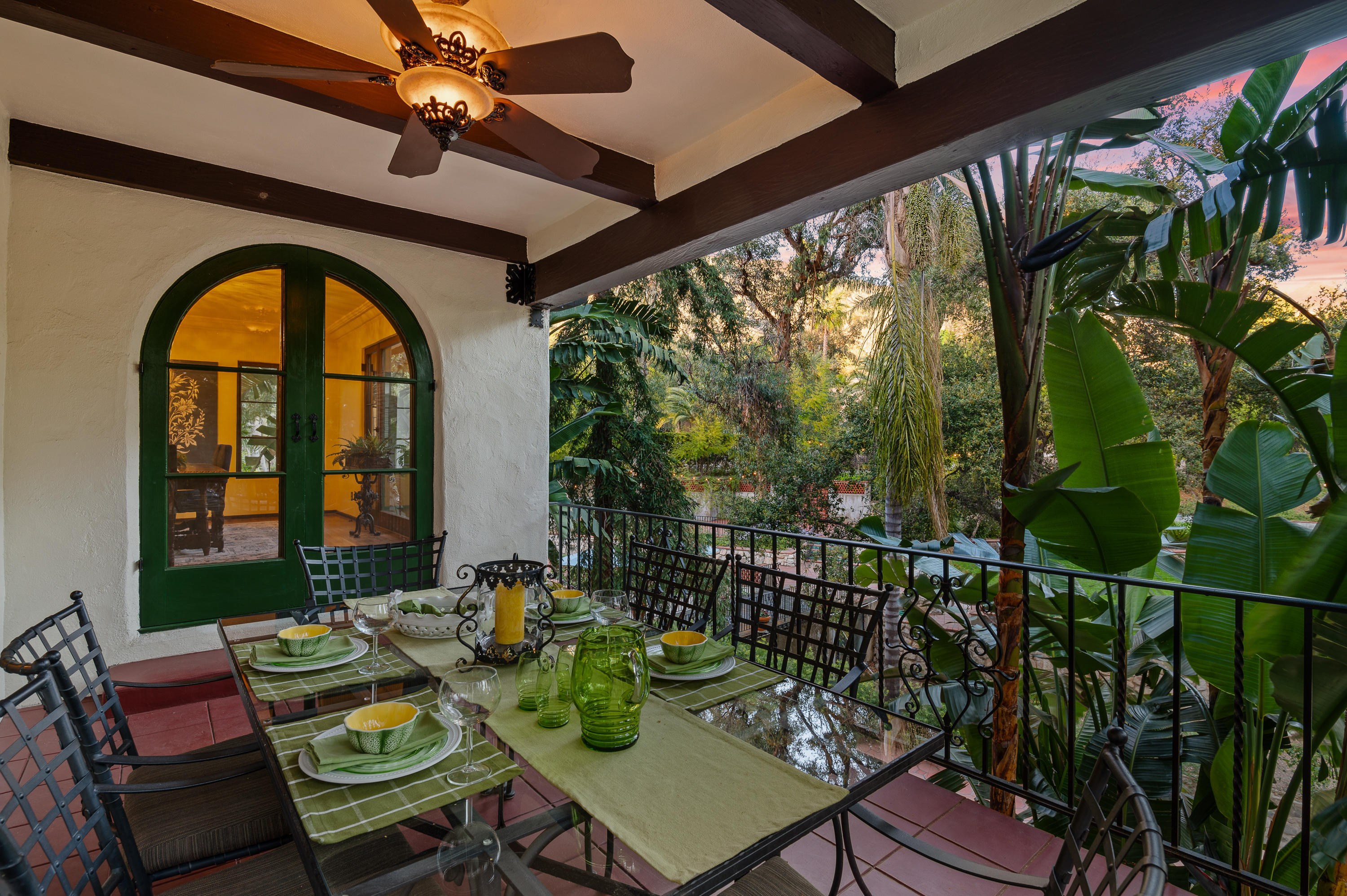 1422 East Palm Street Altadena, CA 91001 - Photo 16 of 64 a roof deck with table and chairs and potted plants
