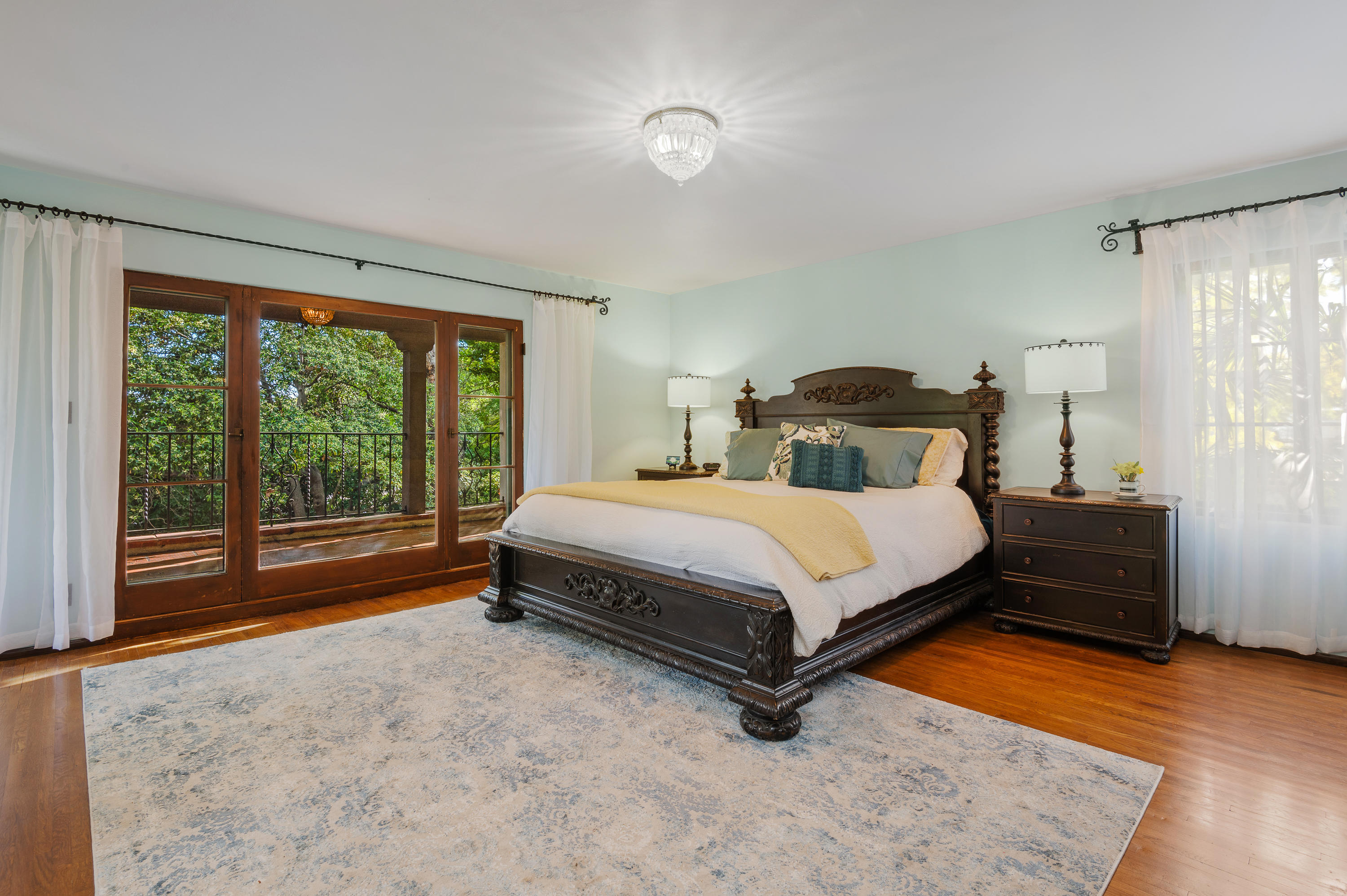 1422 East Palm Street Altadena, CA 91001 - Photo 25 of 64 a bedroom with a bed and wooden floor