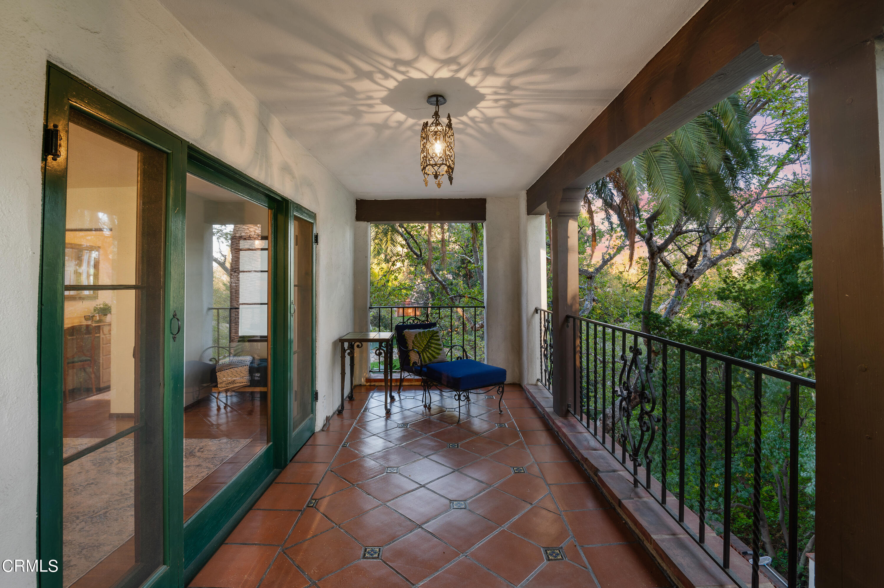 1422 East Palm Street Altadena, CA 91001 - Photo 30 of 64 a view of a porch with chairs and couches