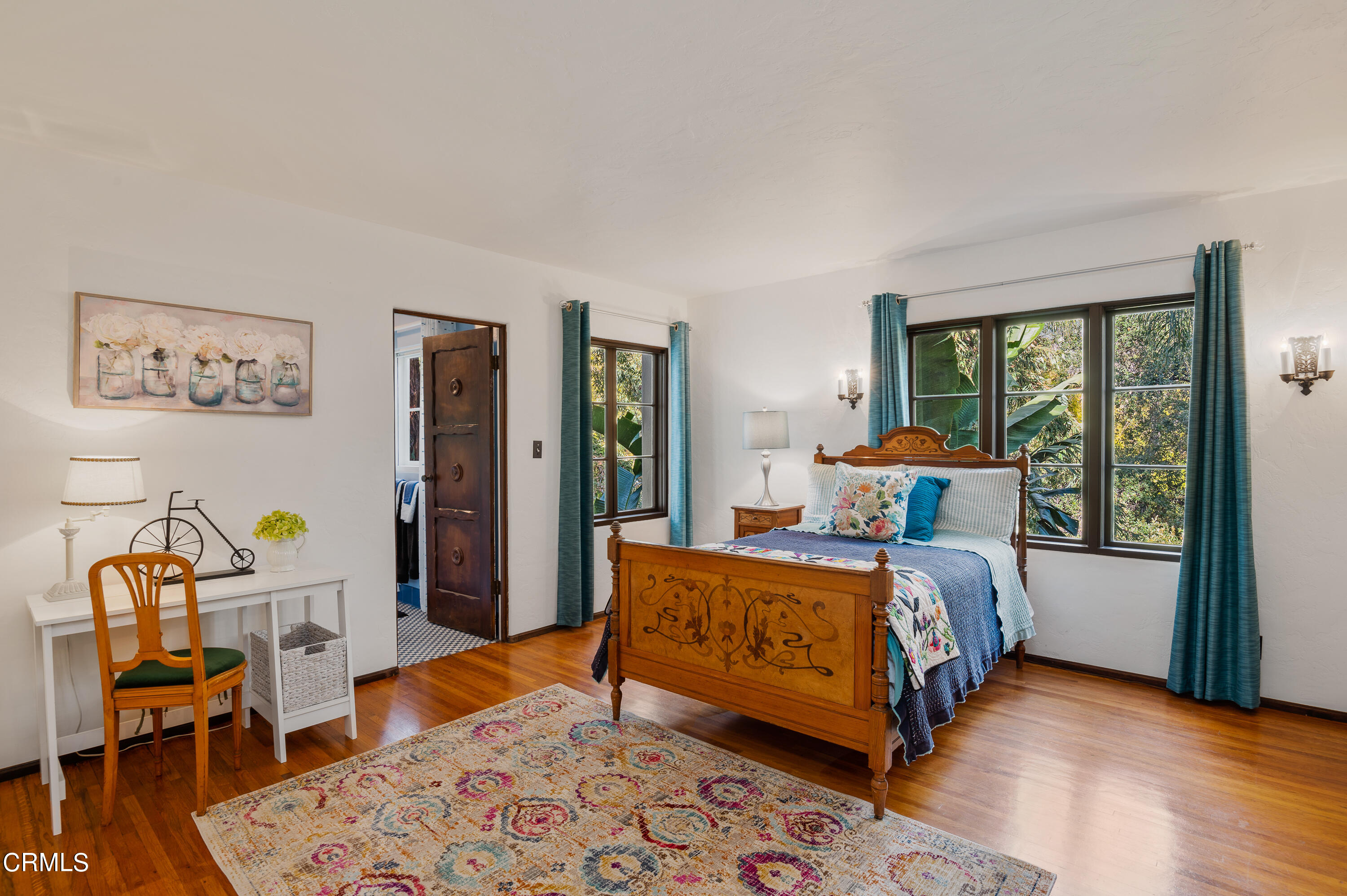 1422 East Palm Street Altadena, CA 91001 - Photo 31 of 64 a bedroom with a bed and wooden floor