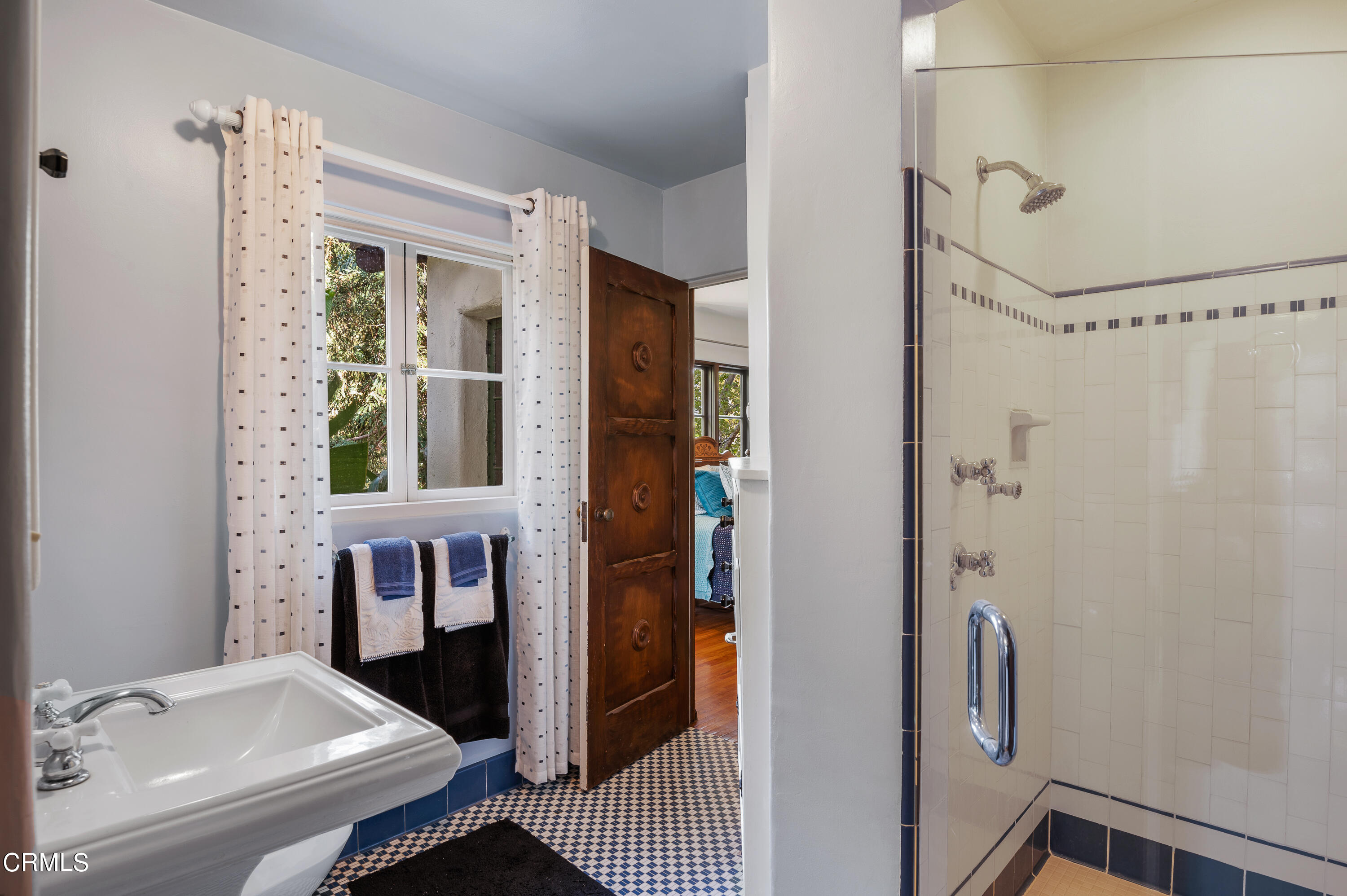 1422 East Palm Street Altadena, CA 91001 - Photo 32 of 64 a bathroom with a sink and a mirror