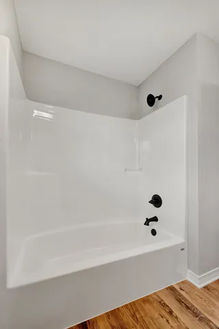 a bathroom with a bathtub