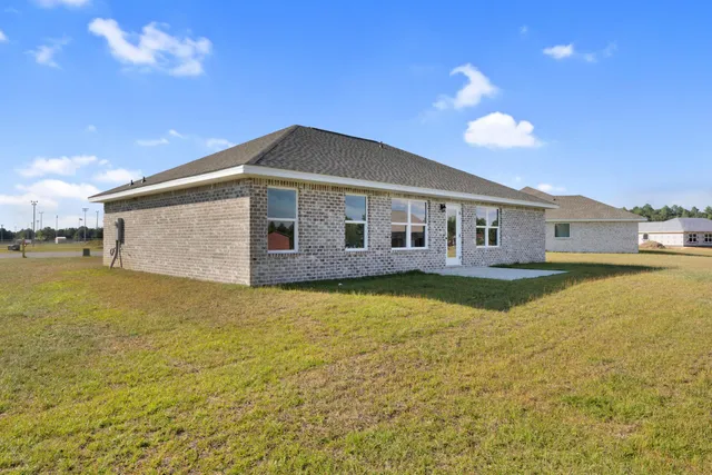 a front view of a house with swimming pool