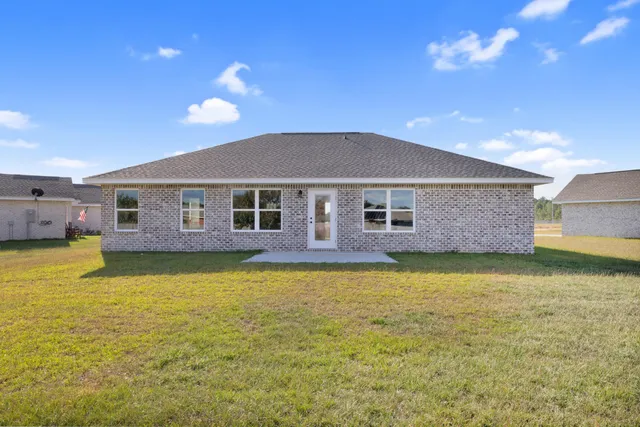 a front view of a house with swimming pool