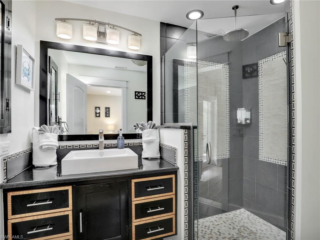 1268 Lake Shore Drive Naples, FL 34103 - Photo 10 of 23 Beautifully remodeled primary bathroom.