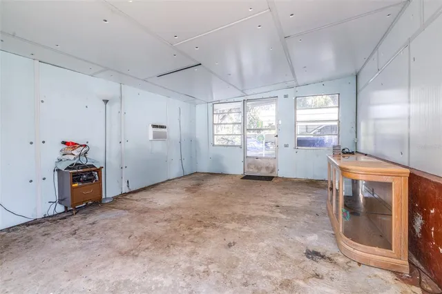 a view of a yard with large trees