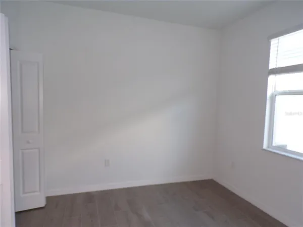 an empty room with a window