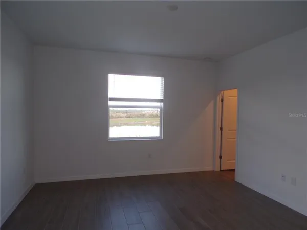 a bathroom with a double vanity sink and mirror