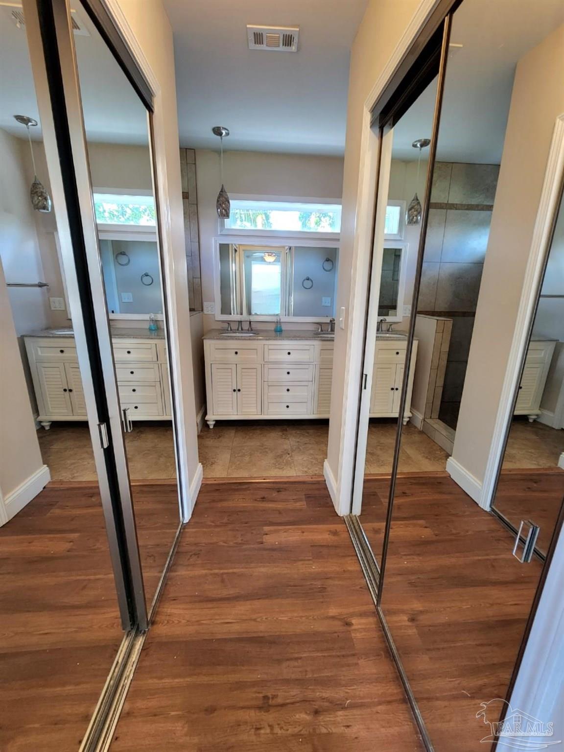 206 Berry Road Pensacola, FL 32507 - Photo 12 of 17 a view of hallway with wooden floor